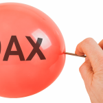 Dax kämpft gegen neue Belastungen